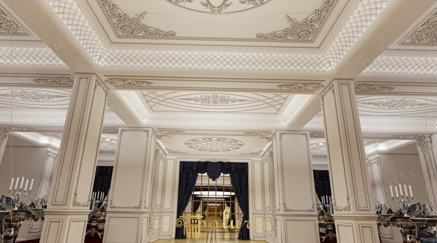 Poliüretan ile Zamanın Ötesine Geçen Estetik: Klasik İç Mekan Tasarımları ve Düğün Salonu Dekorasyon Fikirleri ve Örnekleri <p>
<h1>Poliüretan ile Klasik İç Çephe Tasarımları</h1>
<p>Poliüretan, estetik ve işlevselliği bir araya getiren modern bir malzemedir. Klasik iç mekan tasarımlarında kullanılan poliüretan, zamana meydan okuyan şıklığı ile dikkat çekmektedir. Özellikle düğün salonları gibi özel etkinlik alanlarında, zarif ve şık bir atmosfer yaratmak için ideal bir tercihtir.</p>
<h2>Klasik Düğün Salonu Dekorasyon Modelleri</h2>
<p>Klasik düğün salonları, genellikle lüks ve zarif bir atmosfer sunar. Poliüretan dekorasyon unsurları, bu tarz mekanların estetiğini artırmak için kullanılmaktadır. Tavan süslemeleri, duvar kaplamaları ve kolon detayları gibi unsurlar, poliüretan ile kolaylıkla uygulanabilir.</p>
<h3>Tavan Süslemeleri</h3>
<p>Poliüretan tavan süslemeleri, klasik tasarımlara zarif bir dokunuş ekler. Yüksek tavanlarda kullanılan poliüretan rozetler ve süslemeler, mekanı daha ferah ve şık gösterir. Farklı desen ve motif seçenekleri ile kişisel zevklere uygun tasarımlar oluşturmak mümkündür.</p>
<h3>Duvar Kaplamaları</h3>
<p>Duvarlarda kullanılan poliüretan kaplamalar, klasik iç mekan tasarımlarında önemli bir rol oynar. Düz veya kabartmalı seçenekler ile duvarlar, mekanın genel havasını değiştirebilir. Ayrıca, poliüretan kaplamalar kolayca uygulanabilir ve bakım gerektirmez.</p>
<h3>Kolon Detayları</h3>
<p>Poliüretan kolon kaplamaları, klasik mimarinin vazgeçilmez bir parçasıdır. Bu kaplamalar, mekanın görsel etkisini artırırken, aynı zamanda yapısal destek de sağlar. Farklı boyut ve şekillerdeki kolon detayları, mekanın karakterini belirlemede önemli bir rol oynar.</p>
<h2>Poliüretan ile Dekorasyon Fikirleri</h2>
<p>Poliüretan malzeme ile yapılacak dekorasyonlar, estetik açıdan zengin ve fonksiyonel alanlar yaratmak için idealdir. Klasik tarzdaki düğün salonları için aşağıdaki dekorasyon fikirlerini değerlendirebilirsiniz:</p>
<ul>
<li>Poliüretan çerçeveli aynalar kullanarak mekanın derinliğini artırabilirsiniz.</li>
<li>Desenli poliüretan paneller ile duvarlarınızı farklılaştırabilirsiniz.</li>
<li>Özel tasarım poliüretan aydınlatma elemanları ile atmosferi zenginleştirebilirsiniz.</li>
<li>Klasik tarzda poliüretan mobilyalar ile mekanınıza uyum sağlayabilirsiniz.</li>
</ul>
<h2>Sonuç</h2>
<p>Poliüretan, klasik iç çephe tasarımlarında hem estetik hem de işlevsellik sunan bir malzemedir. Düğün salonları gibi özel mekanlarda, bu malzeme ile yapılan dekorasyonlar, zarif ve şık bir atmosfer yaratır. Klasik tasarım unsurlarını modern bir şekilde yorumlayarak, unutulmaz mekanlar oluşturmak mümkündür.</p>
</p><br><hr></hr>