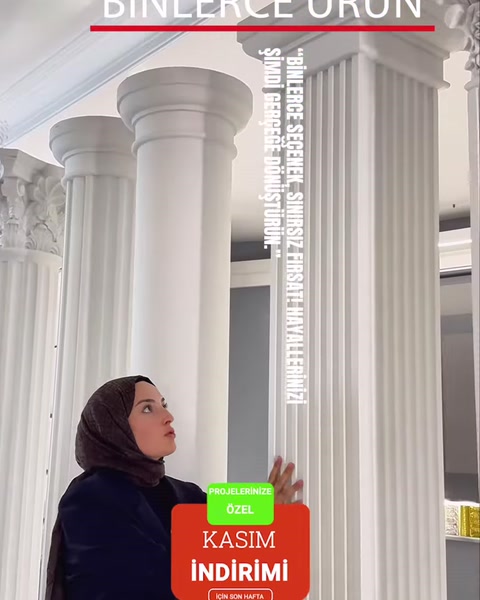 Yivli beyaz sütunların başlık ve gövde detayları gösteriliyor